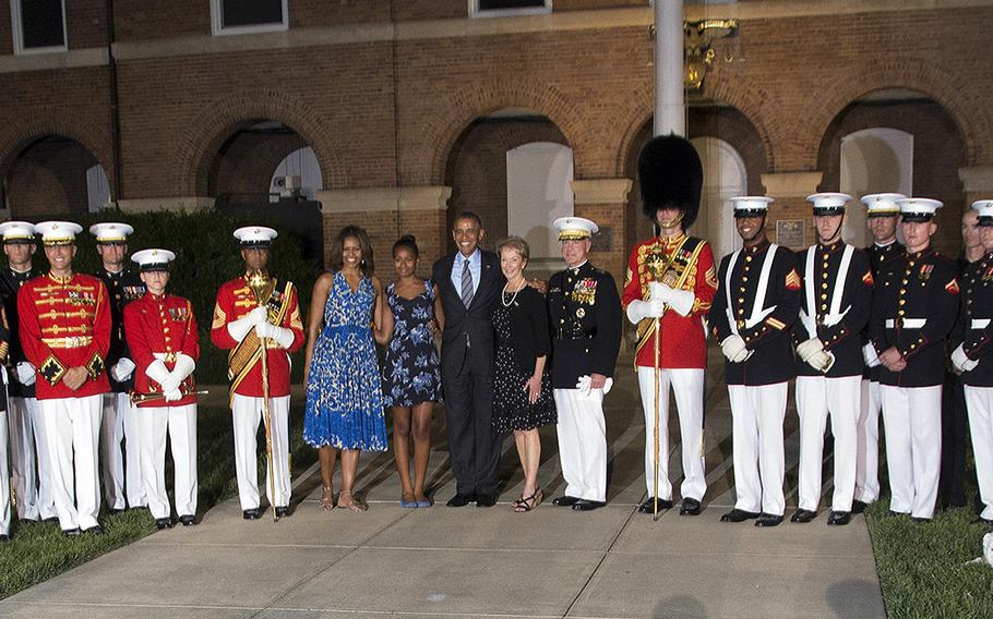 Obamas attend evening parade at Marine Barracks Washington Stars